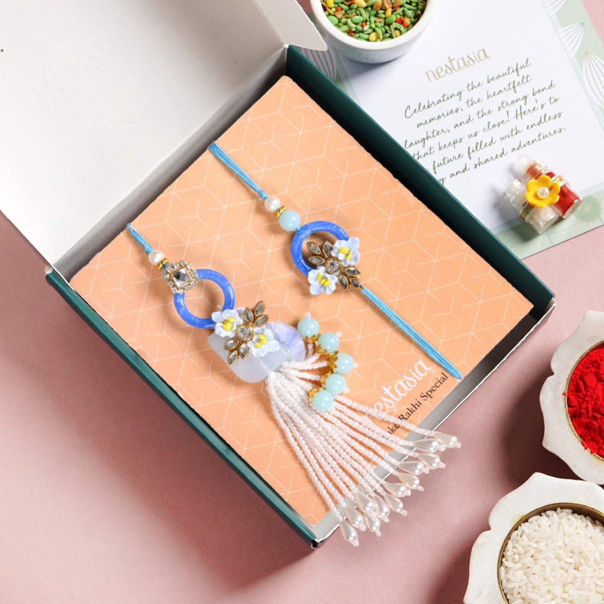 Bloom Bond Rakhi Lumba Set In Blue Nestasia