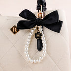 Blooming Bow Keychain With Pearl Dangler Nestasia