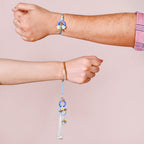Bloom Bond Rakhi Lumba Set In Blue Nestasia