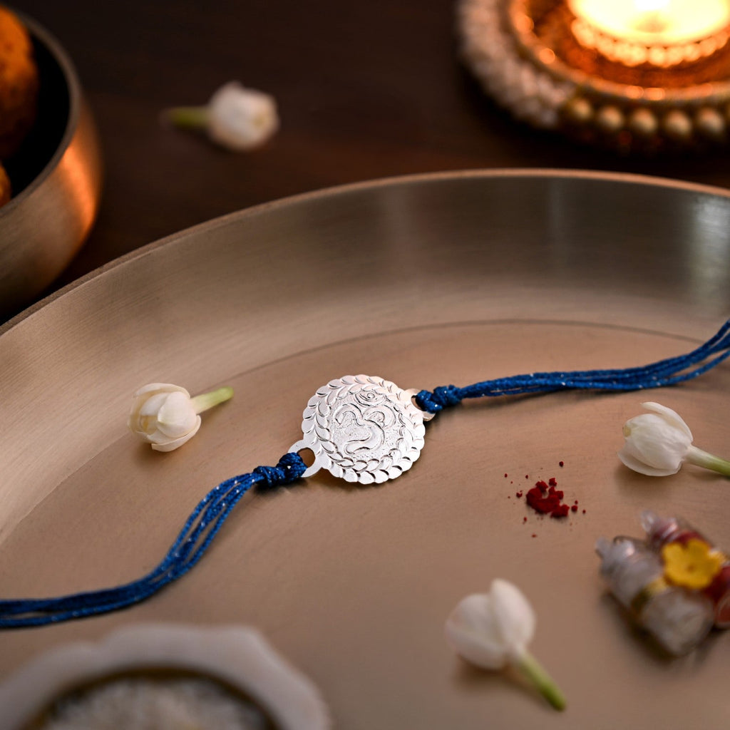 Brass Om Rakhi With Silver Finish Gift Set Nestasia
