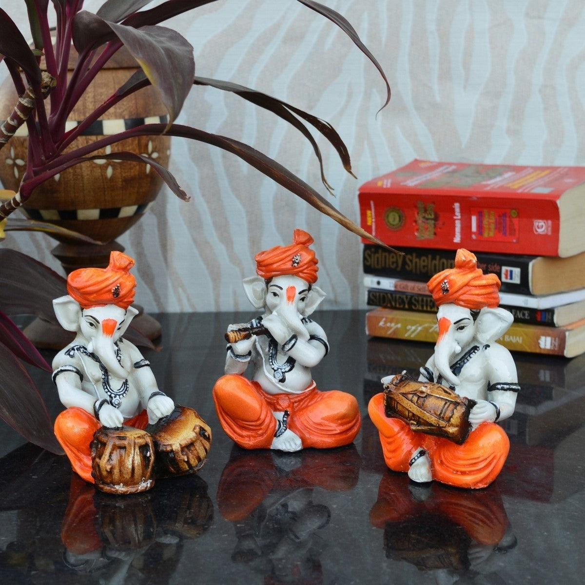 Orange Set of 3 Polyresin Ganesha Idol Playing Tabla, Flute and Dholak Kafalo
