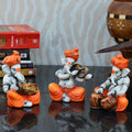 Orange Set of 3 Polyresin Ganesha Idol Playing Dholak, Violin and Tabla Kafalo