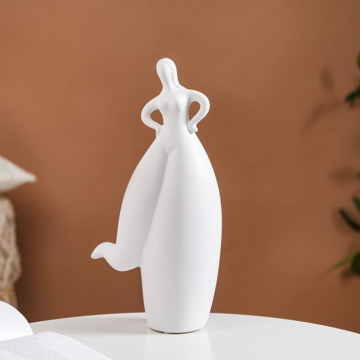 Dancing Girl Akimbo Ceramic Showpiece Nestasia