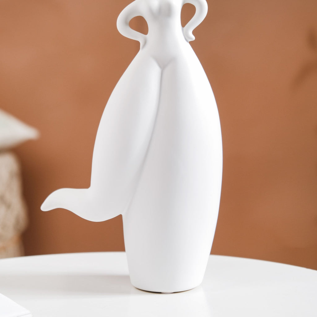 Dancing Girl Akimbo Ceramic Showpiece Nestasia