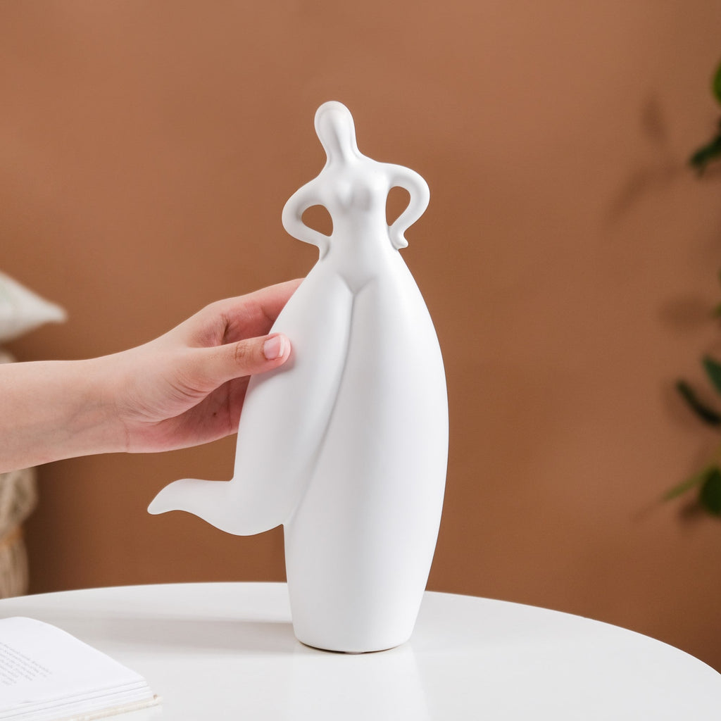 Dancing Girl Akimbo Ceramic Showpiece Nestasia