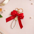 Charming Red Bow Keychain With Pearls Nestasia