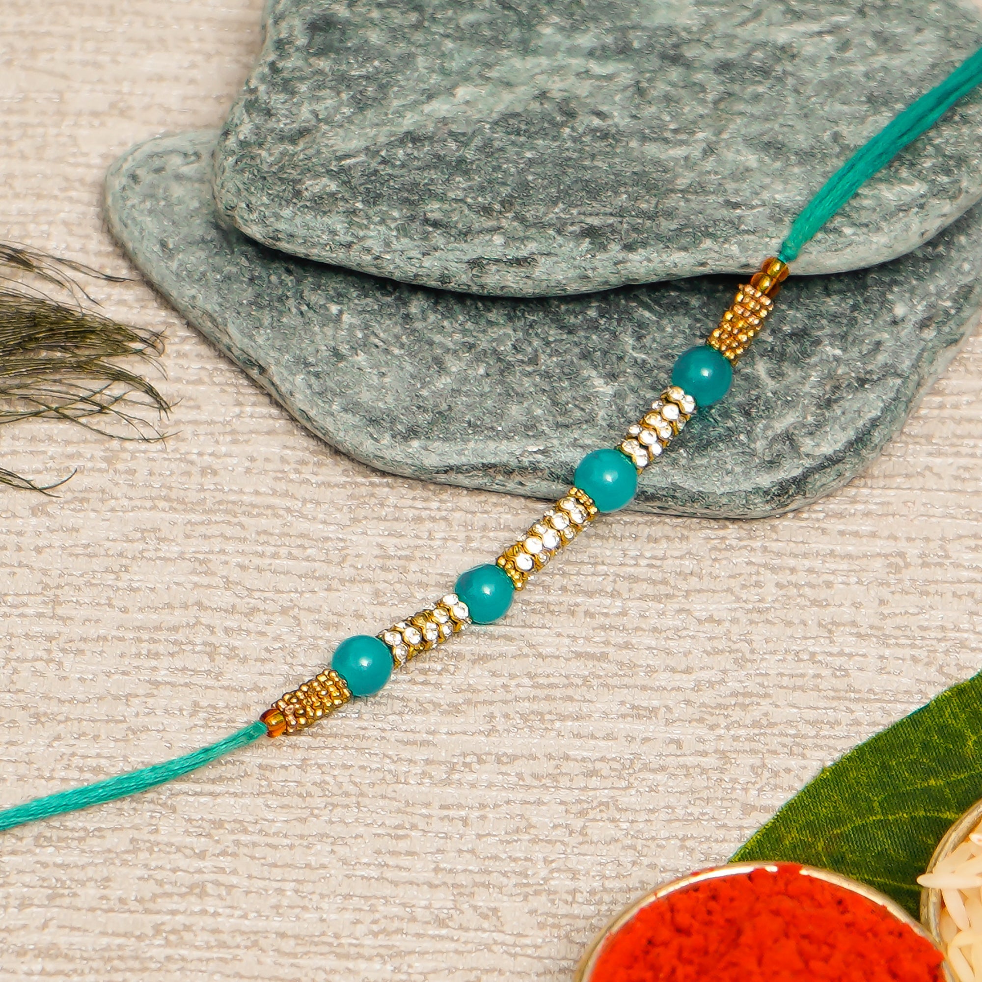 Designer Pearl Rakhi and Roli Chawal Pack Kafalo
