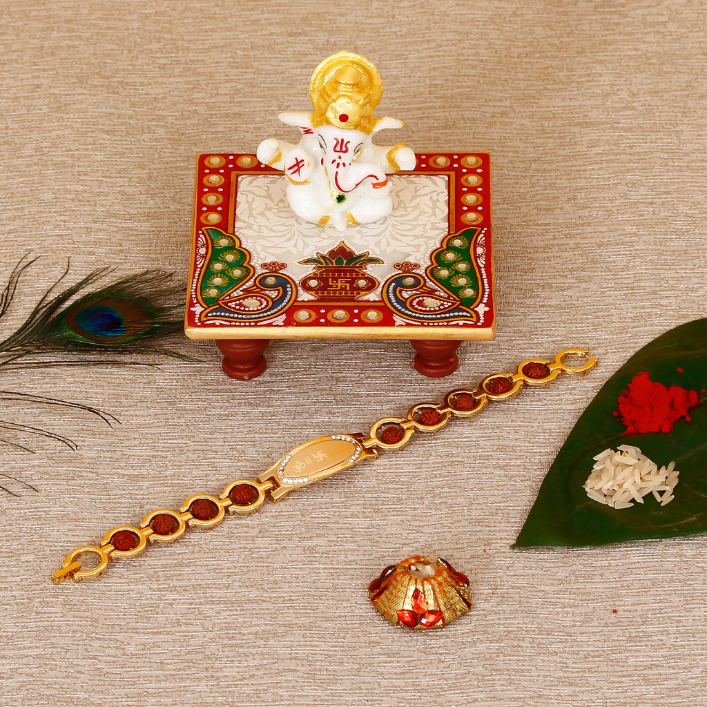 Designer Bracelet Religious Rakhi with Lord Ganesha Marble Chowki and Roli Tikka Matki Kafalo