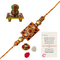 Stone Rudraksh Rakhi with Lord Ganesha on Marble Chowki and Roli Tikka Matki, Best Wishes Greeting Card Kafalo