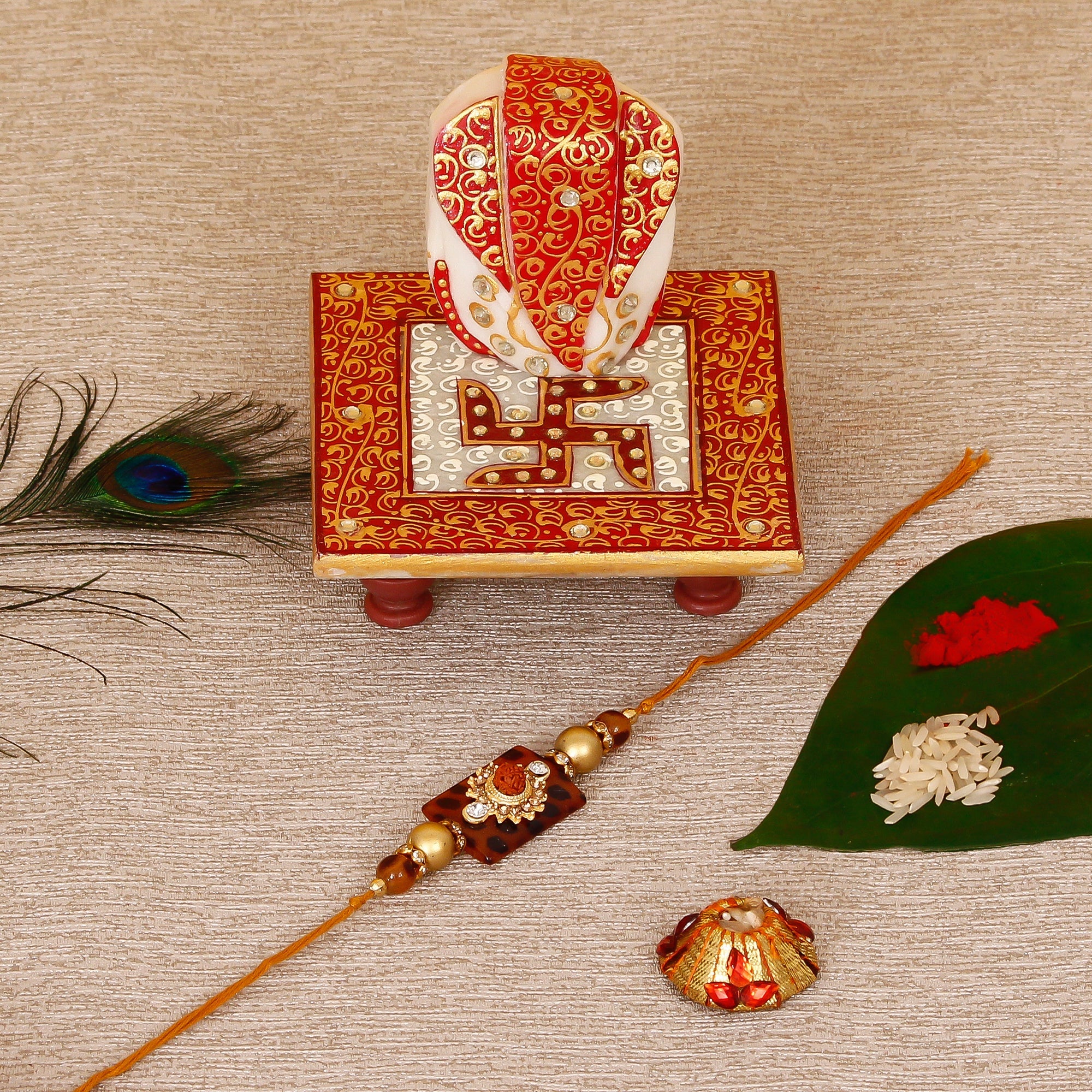 Stone Rudraksh Rakhi with Ridhi Sidhi Marble chowki and Roli Tikka Matki Kafalo