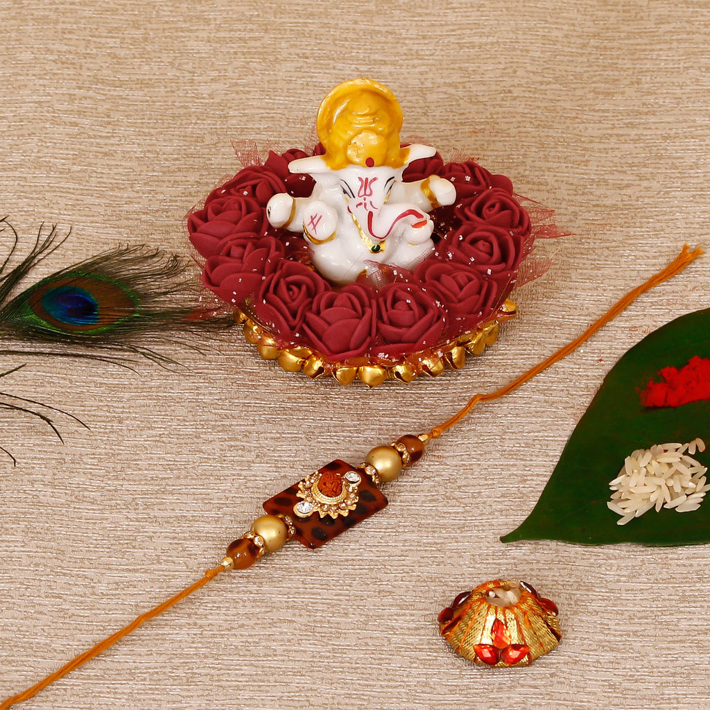 Stone Rudraksh Rakhi with Lord Ganesha Idol on Decorative Plate for Car & Home and Roli Tikka Matki Kafalo