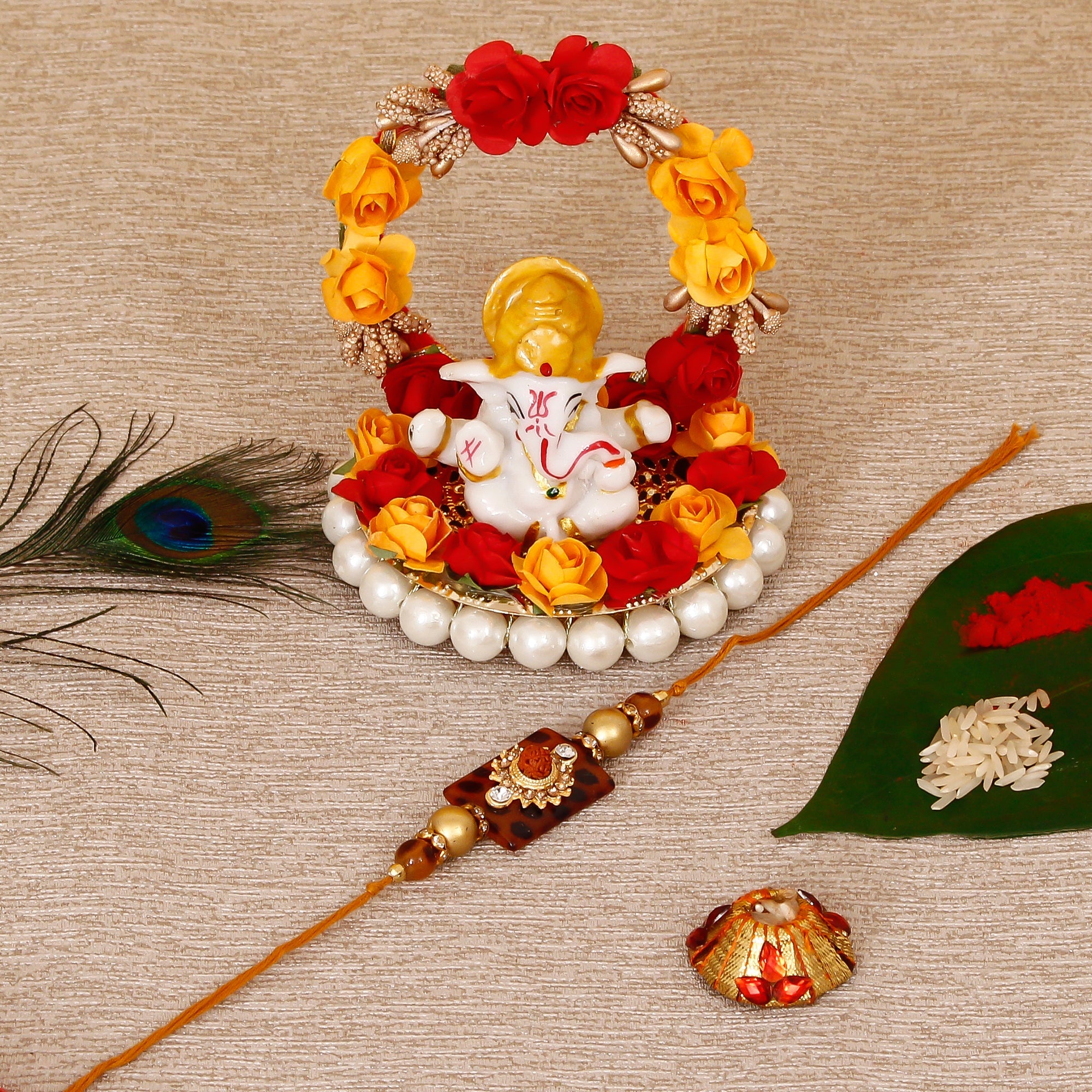 Stone Rudraksh Rakhi with Lord Ganesha Idol on Decorative Plate for Car & Home and Roli Tikka Matki Kafalo
