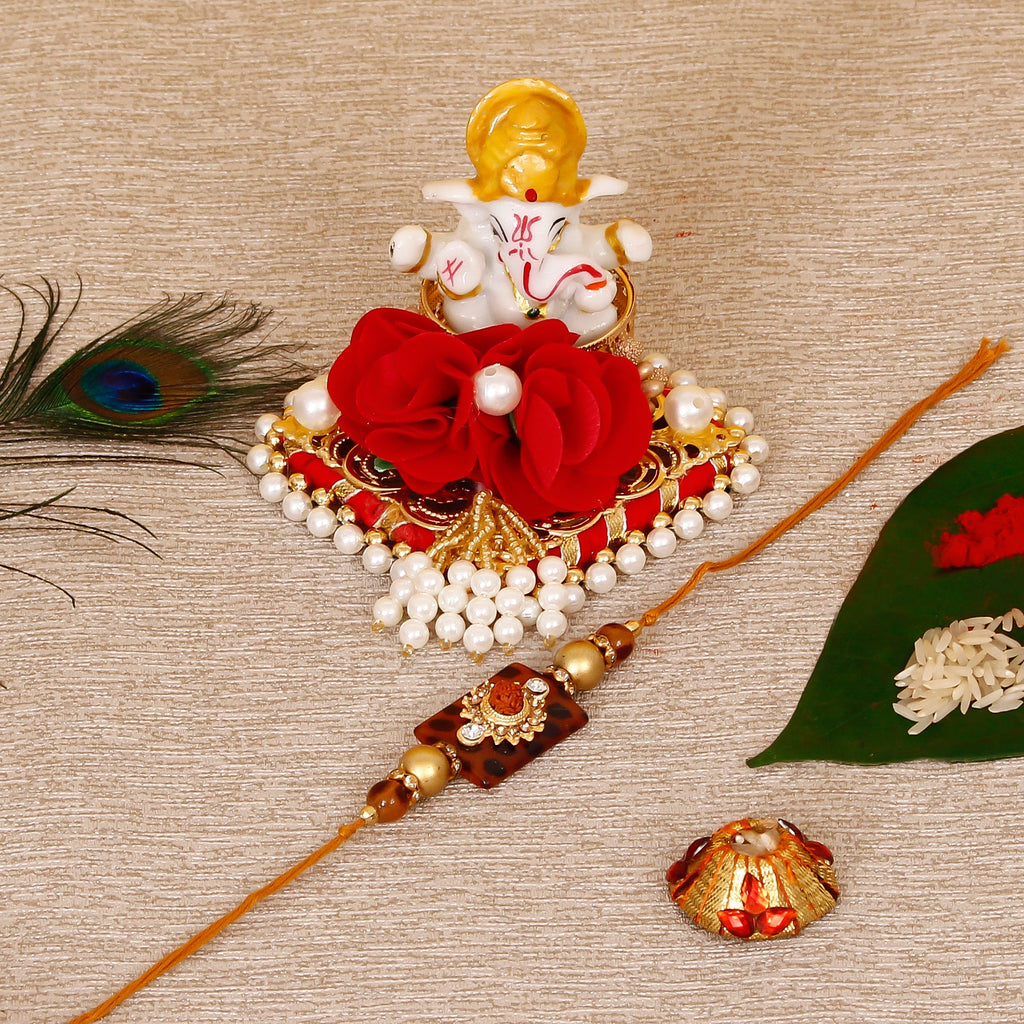 Stone Rudraksh Rakhi with Lord Ganesha Idol on Decorative Plate for Car & Home and Roli Tikka Matki Kafalo