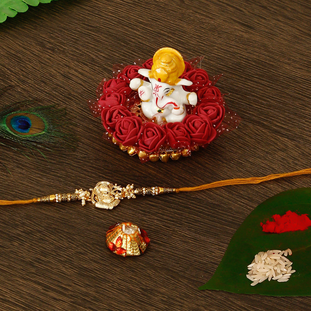 Designer Ganesha Rakhi with Lord Ganesha Idol on Decorative Plate for Car & Home and Roli Tikka Matki Kafalo