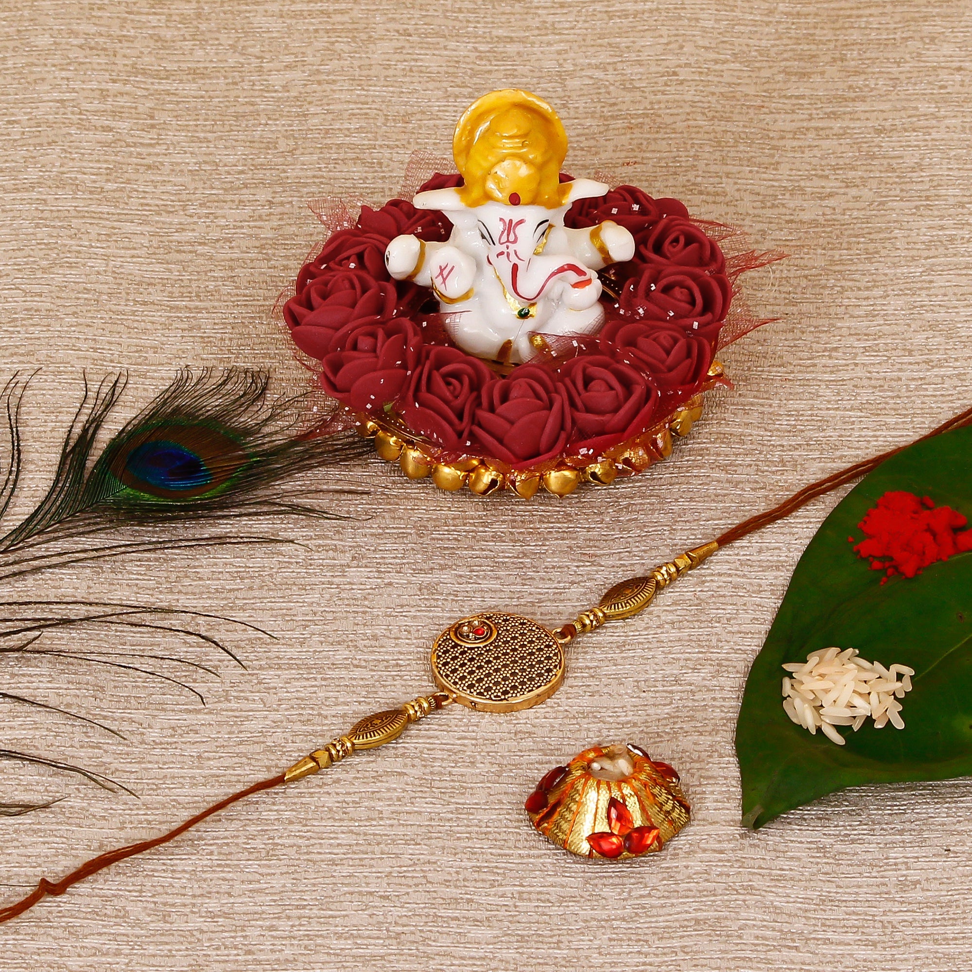 Designer Rakhi with Lord Ganesha Idol on Decorative Plate for Car & Home and Roli Tikka Matki Kafalo