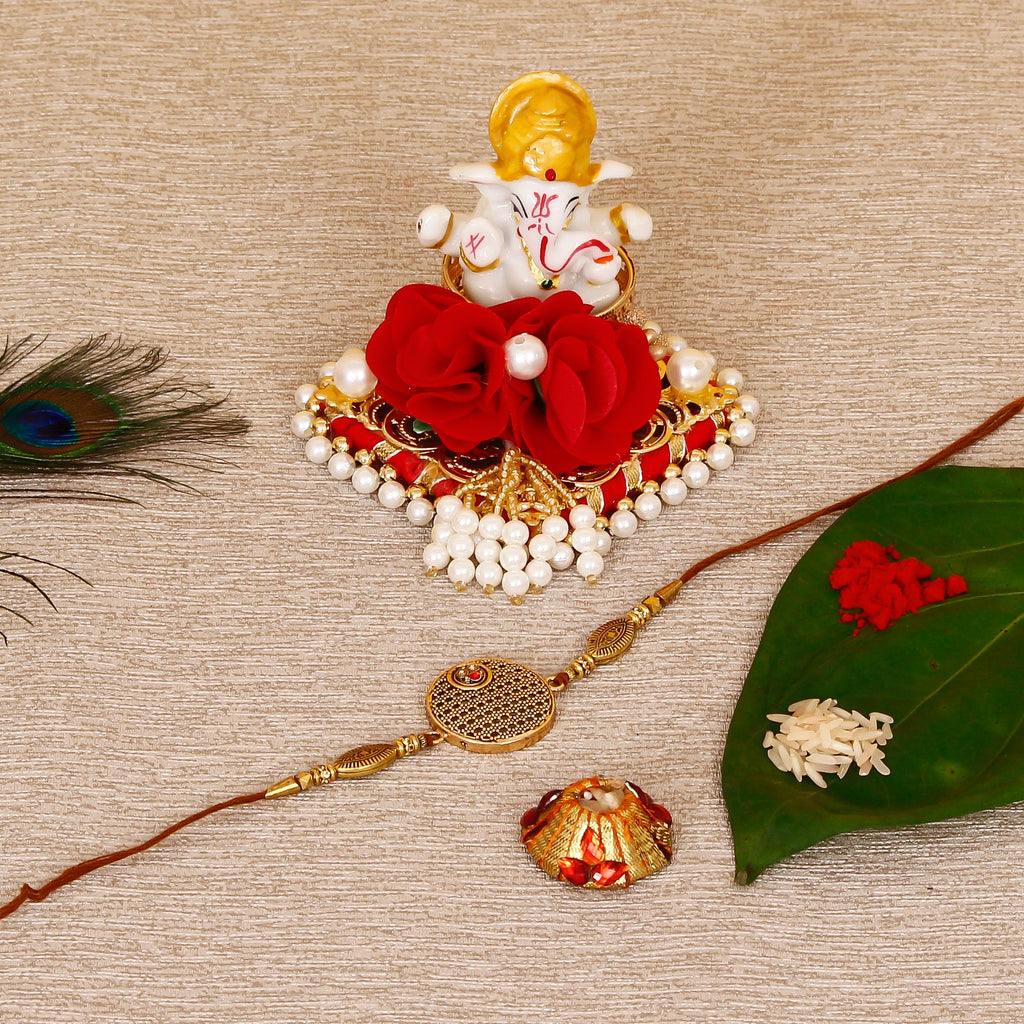 Designer Rakhi with Lord Ganesha Idol on Decorative Plate for Car & Home and Roli Tikka Matki Kafalo