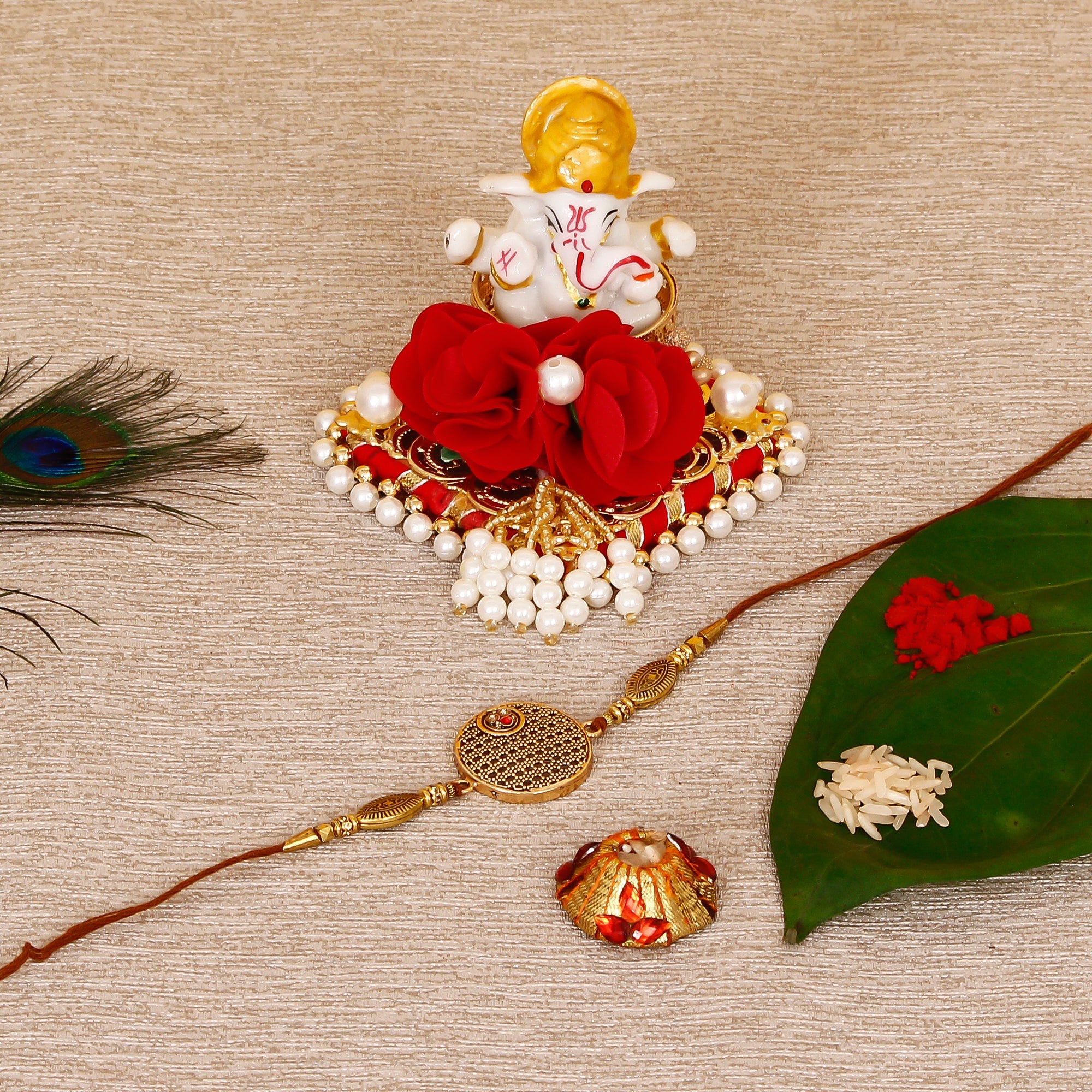 Designer Rakhi with Lord Ganesha Idol on Decorative Plate for Car & Home and Roli Tikka Matki Kafalo