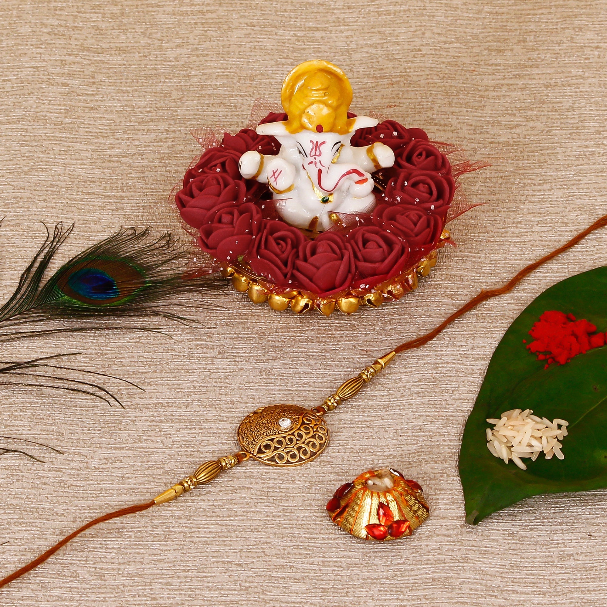Designer Rakhi with Lord Ganesha Idol on Decorative Plate for Car & Home and Roli Tikka Matki Kafalo