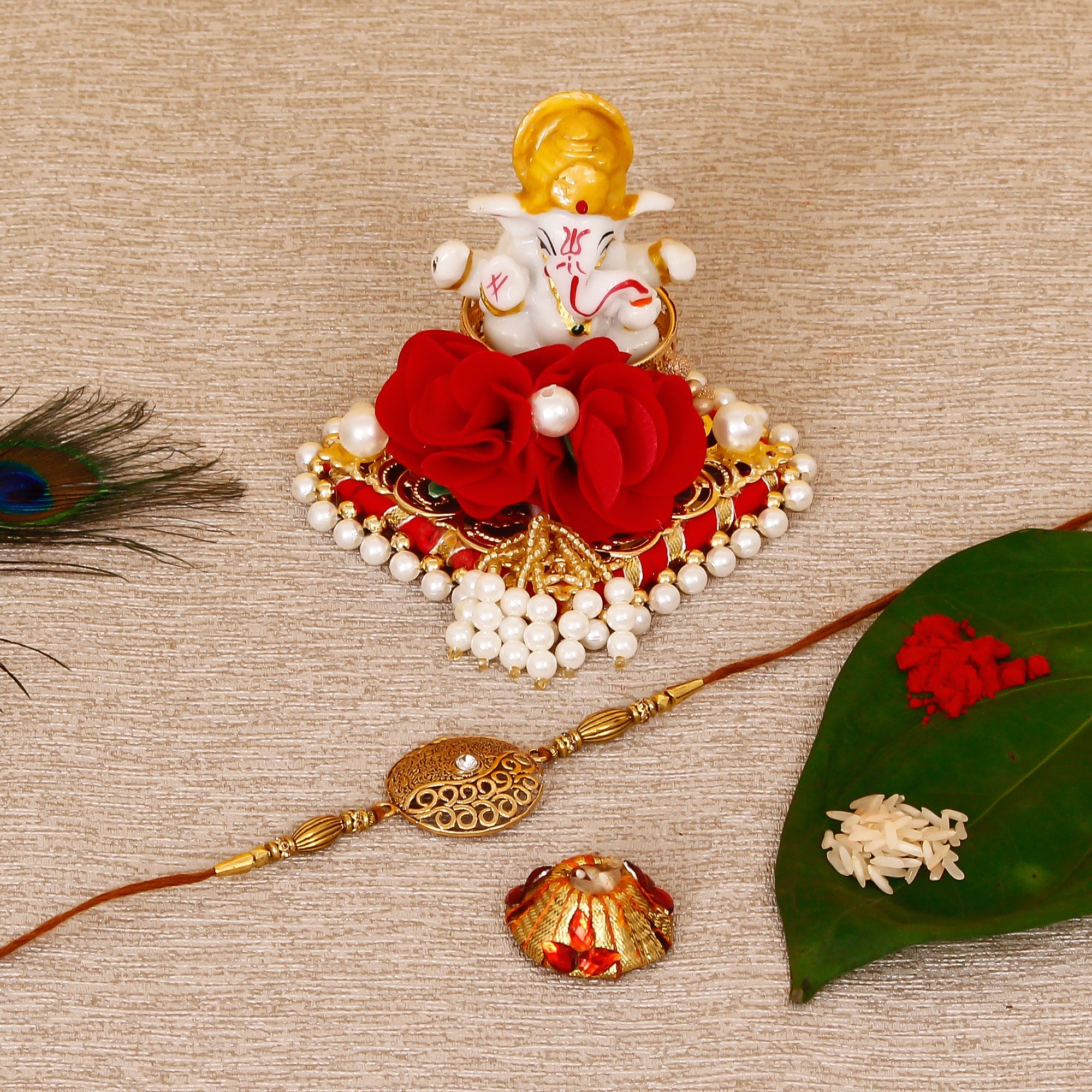 Designer Rakhi with Lord Ganesha Idol on Decorative Plate for Car & Home and Roli Tikka Matki Kafalo