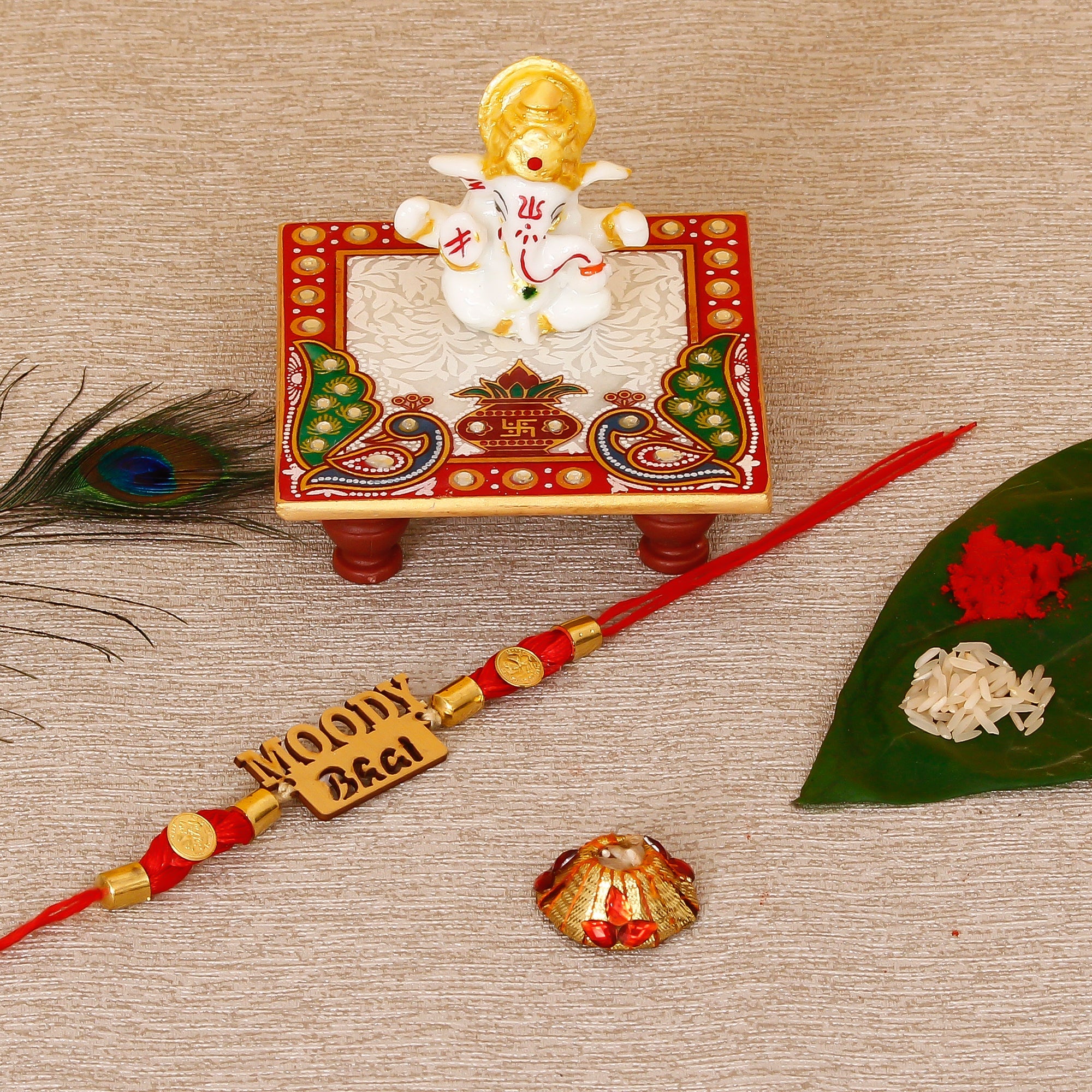 Designer Wooden Moddy Bhai Rakhi with Lord Ganesha Marble Chowki and Roli Tikka Matki Kafalo