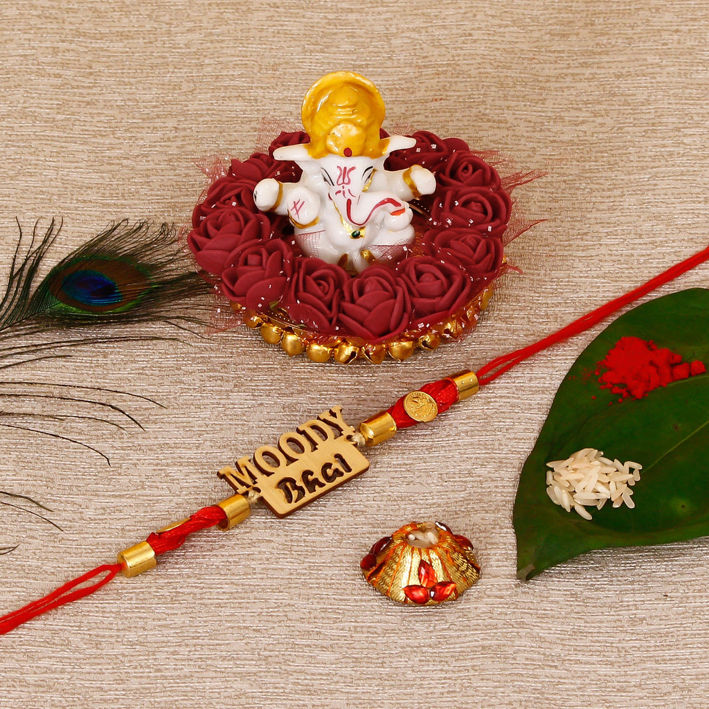 Designer Wooden Moddy Bhai Rakhi with Lord Ganesha Idol on Decorative Plate for Car & Home and Roli Tikka Matki Kafalo