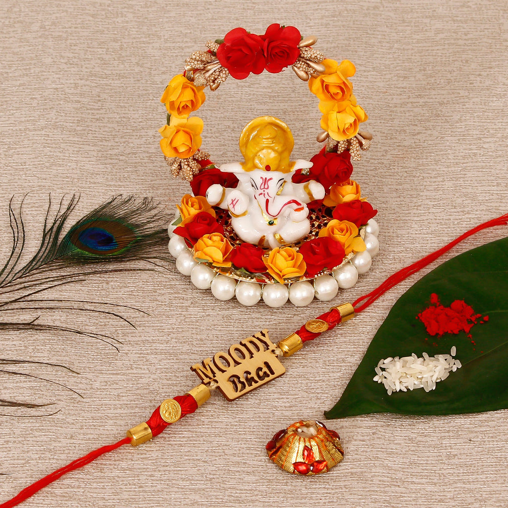 Designer Wooden Moddy Bhai Rakhi with Lord Ganesha Idol on Decorative Plate for Car & Home and Roli Tikka Matki Kafalo