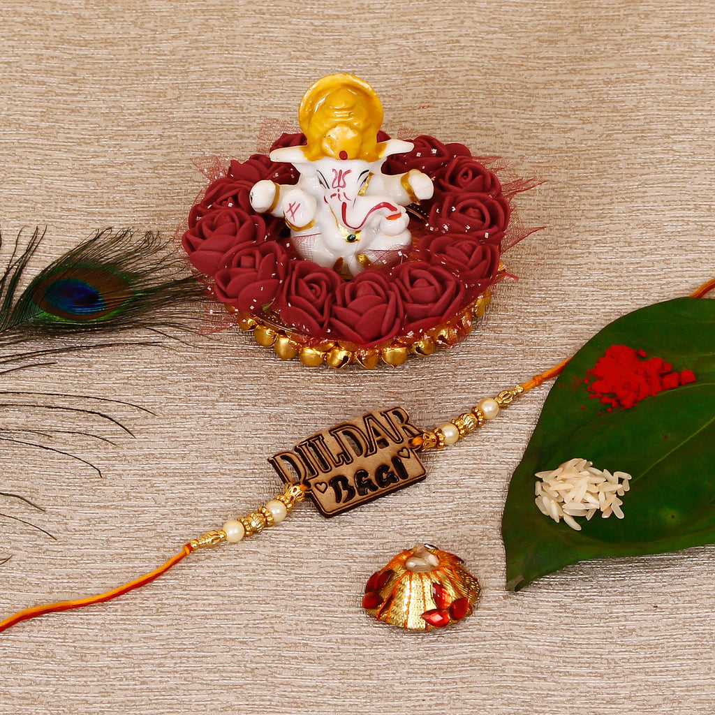 Designer Wooden Dildar Bhai Rakhi with Lord Ganesha Idol on Decorative Plate for Car & Home and Roli Tikka Matki Kafalo
