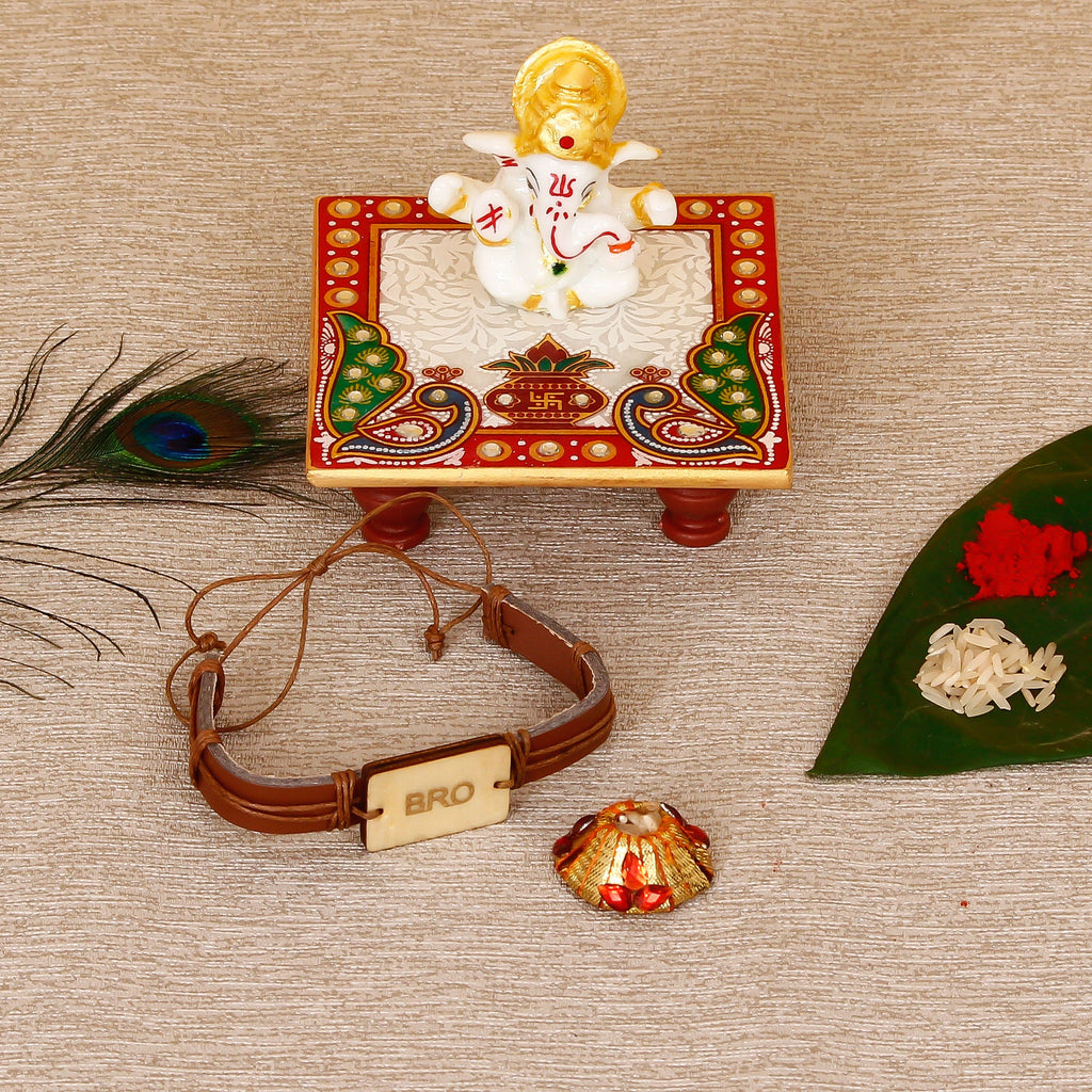 Designer Leather Bracelet BRO Rakhi with Lord Ganesha Marble Chowki and Roli Tikka Matki Kafalo