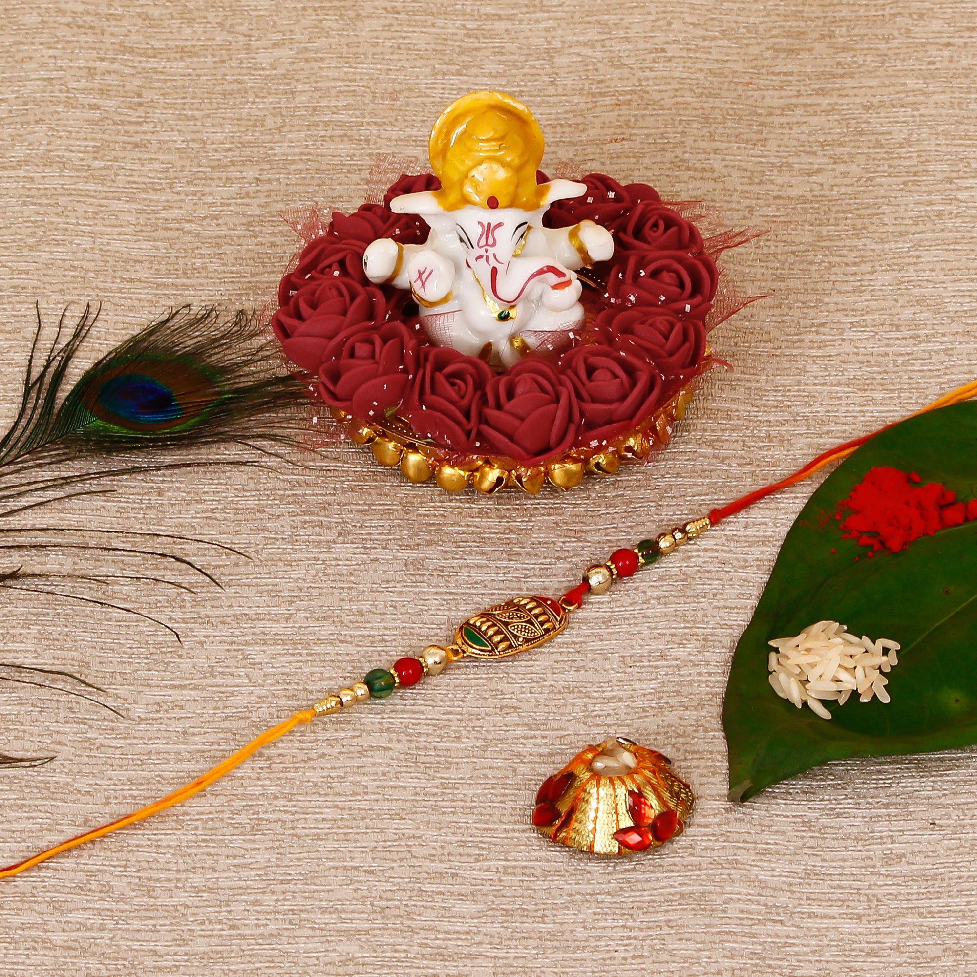 Designer Rakhi with Lord Ganesha Idol on Decorative Plate for Car & Home and Roli Tikka Matki Kafalo