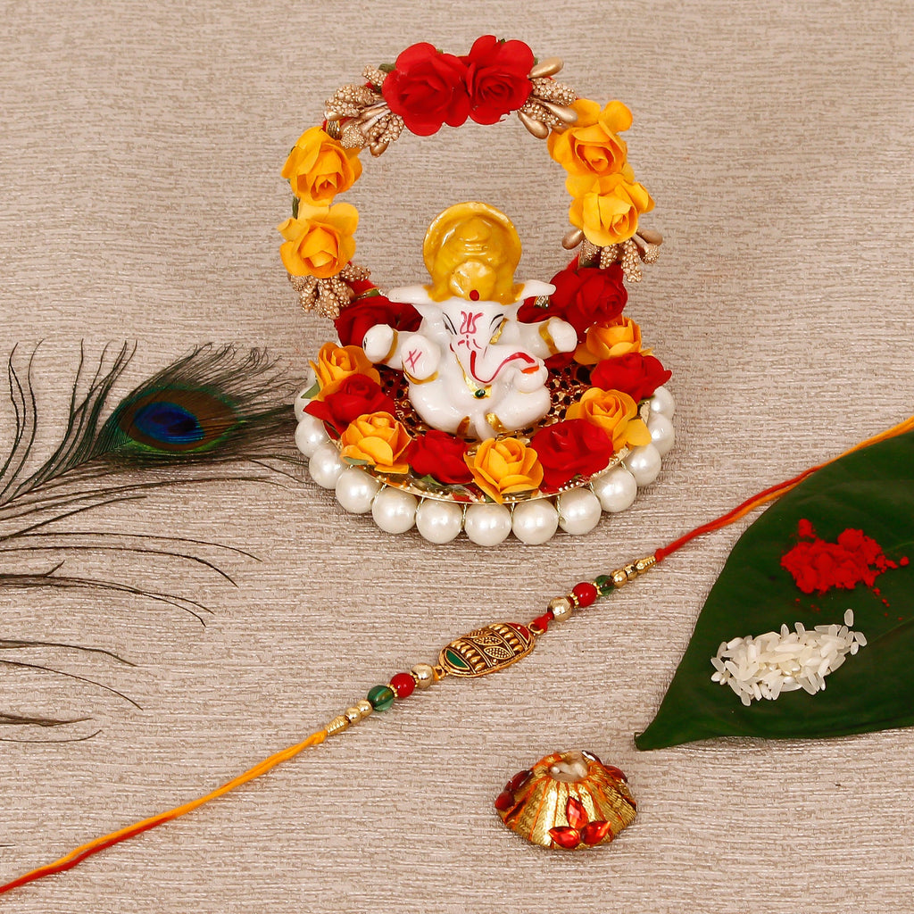 Designer Rakhi with Lord Ganesha Idol on Decorative Plate for Car & Home and Roli Tikka Matki Kafalo