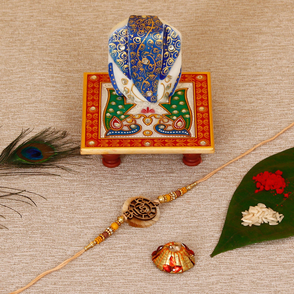 Designer Wooden Bhai Rakhi with Lord Ganesha on Marble Chowki and Roli Tikka Matki Kafalo