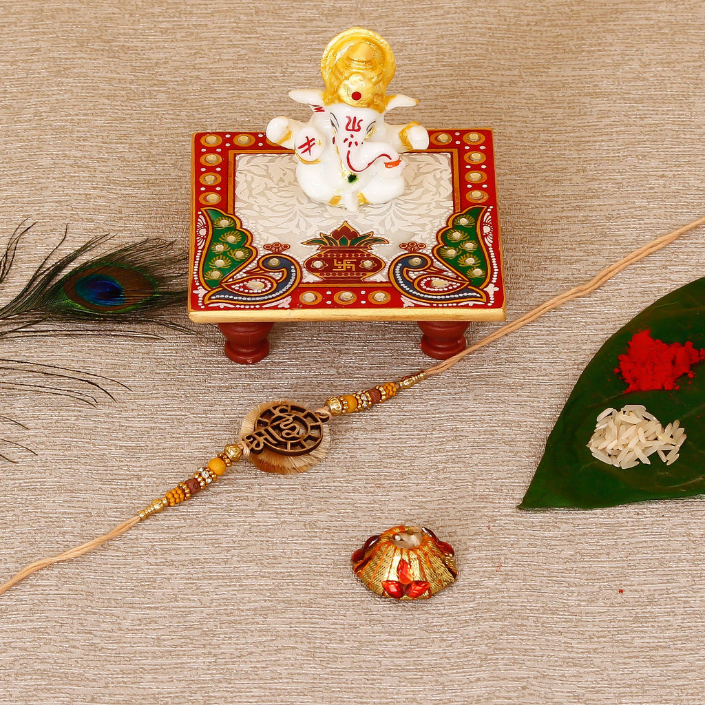 Designer Wooden Bhai Rakhi with Lord Ganesha Marble Chowki and Roli Tikka Matki Kafalo