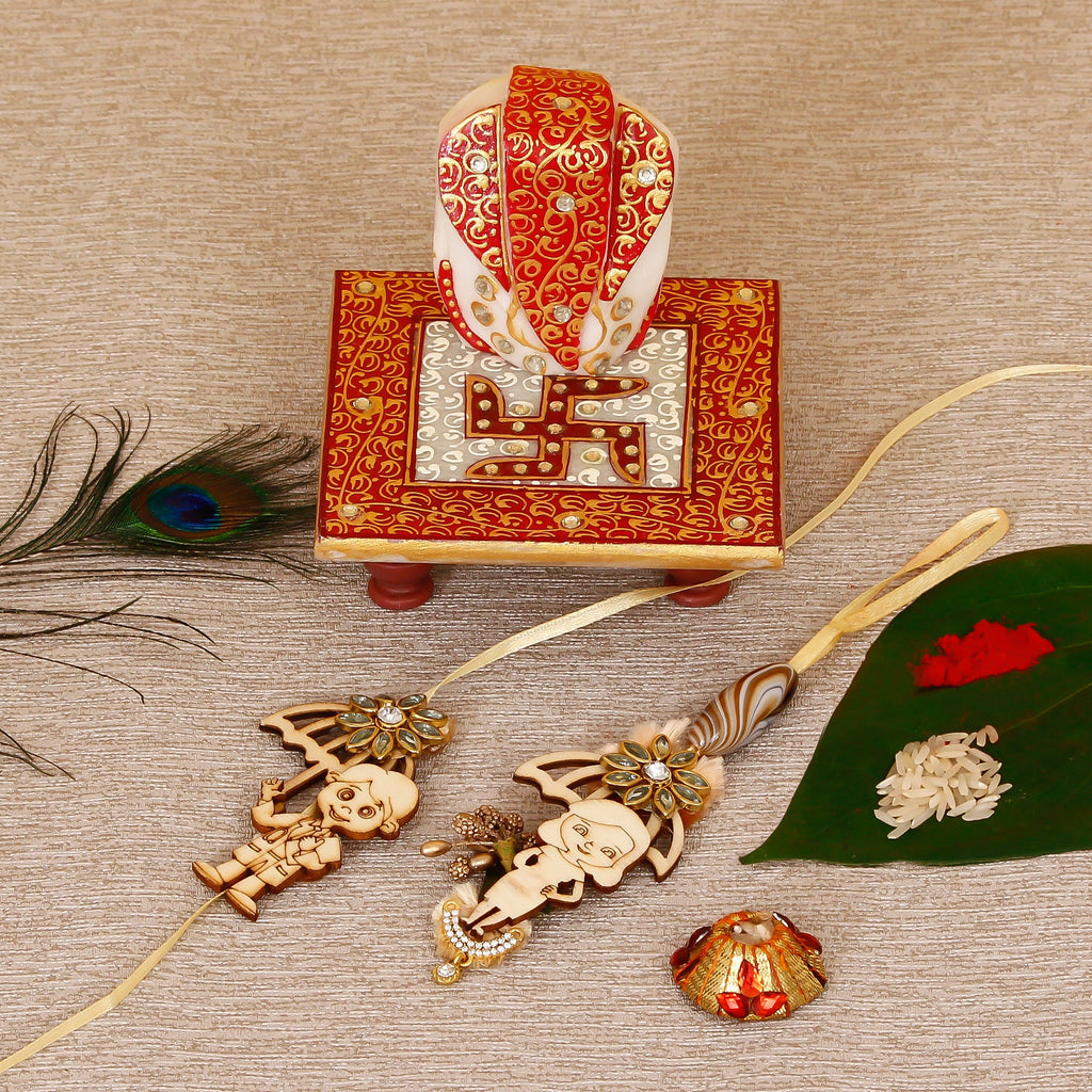 Designer Bhaiya Bhabhi Rakhi with Ridhi Sidhi Marble chowki and Roli Tikka Matki Kafalo