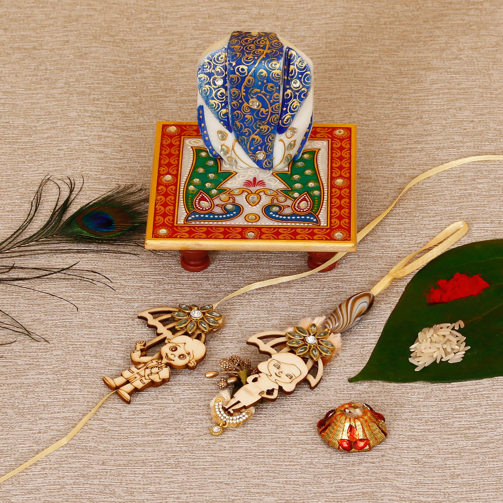 Designer Bhaiya Bhabhi Rakhi with Lord Ganesha on Marble Chowki and Roli Tikka Matki Kafalo
