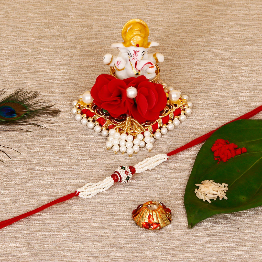 Designer Pearl Rakhi with Lord Ganesha Idol on Decorative Plate for Car & Home and Roli Tikka Matki Kafalo