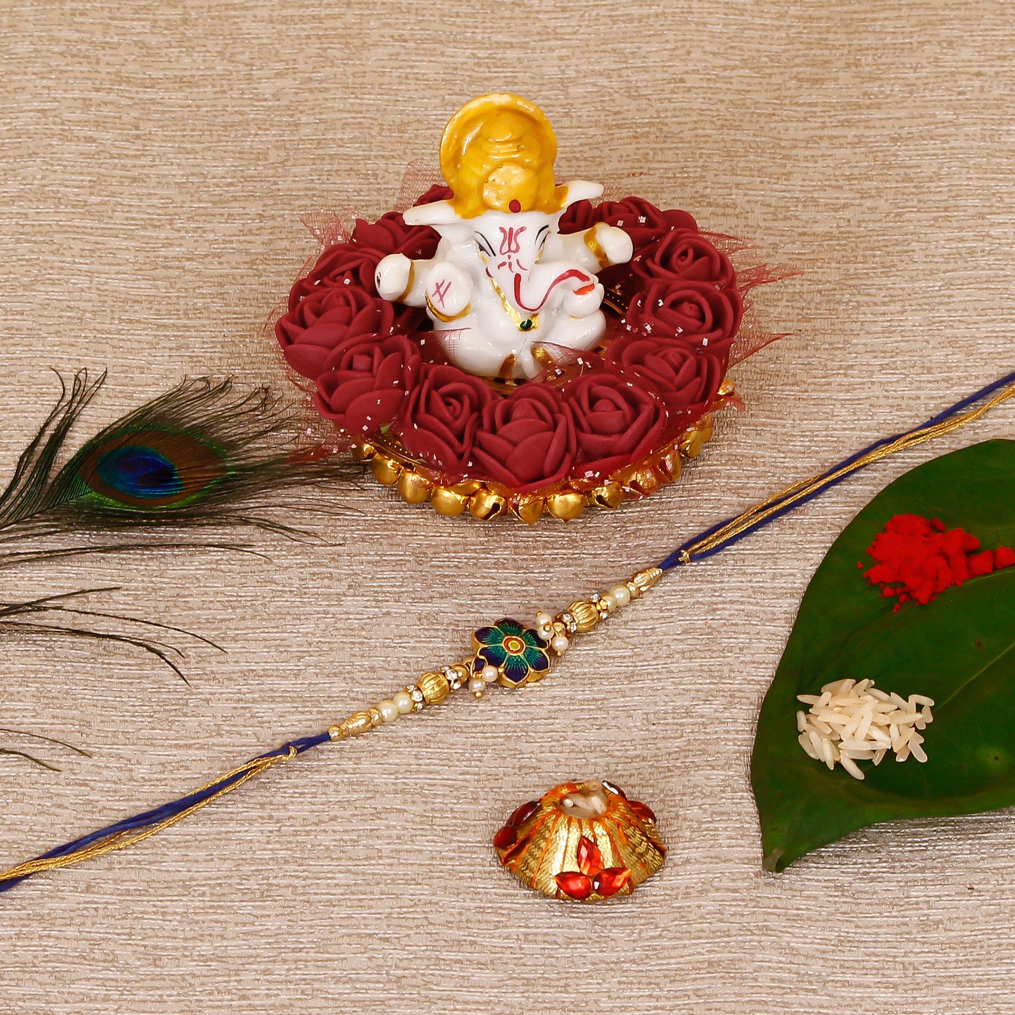 Designer Meenakari Rakhi with Lord Ganesha Idol on Decorative Plate for Car & Home and Roli Tikka Matki Kafalo