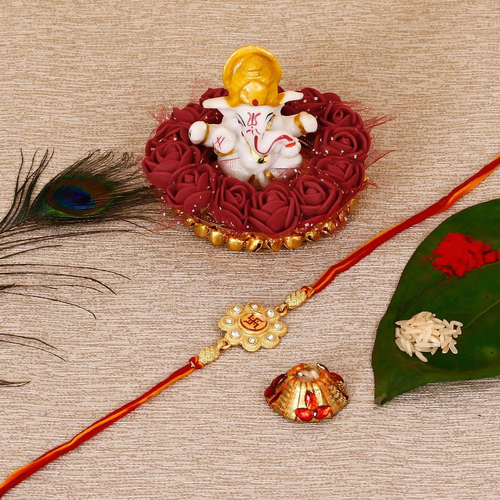 Designer Religious Swastik Rakhi with Lord Ganesha Idol on Decorative Plate for Car & Home and Roli Tikka Matki Kafalo