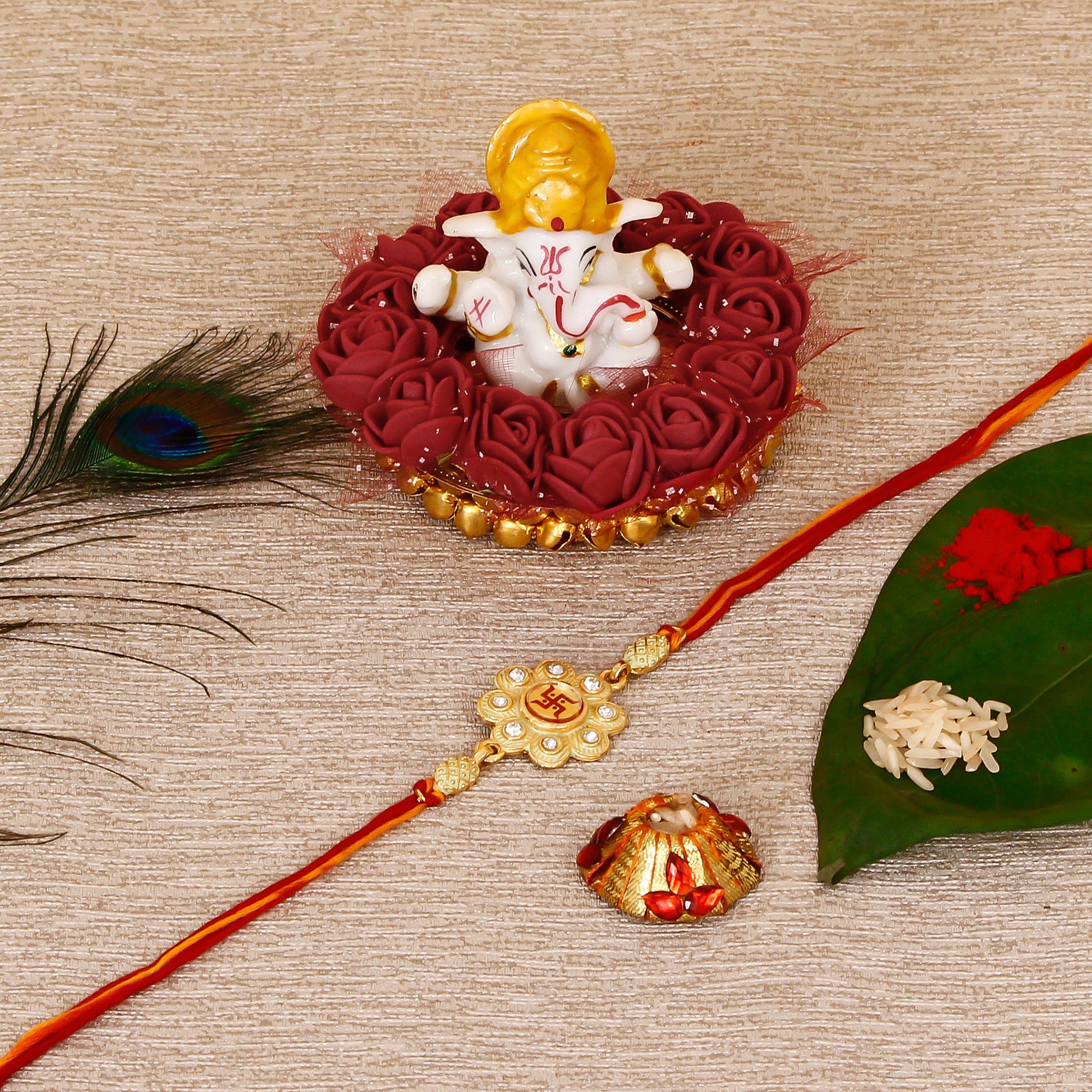 Designer Religious Swastik Rakhi with Lord Ganesha Idol on Decorative Plate for Car & Home and Roli Tikka Matki Kafalo