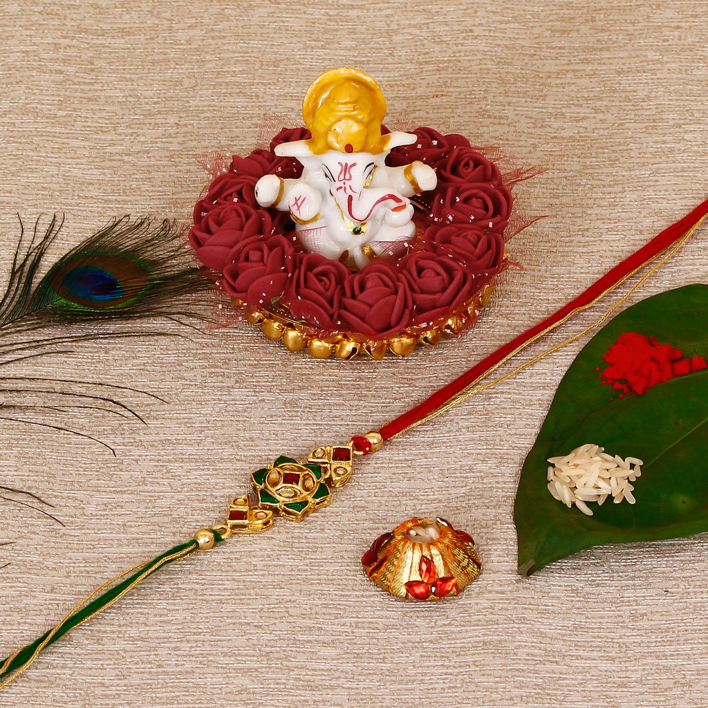 Designer Kundan Rakhi with Lord Ganesha Idol on Decorative Plate for Car & Home and Roli Tikka Matki Kafalo