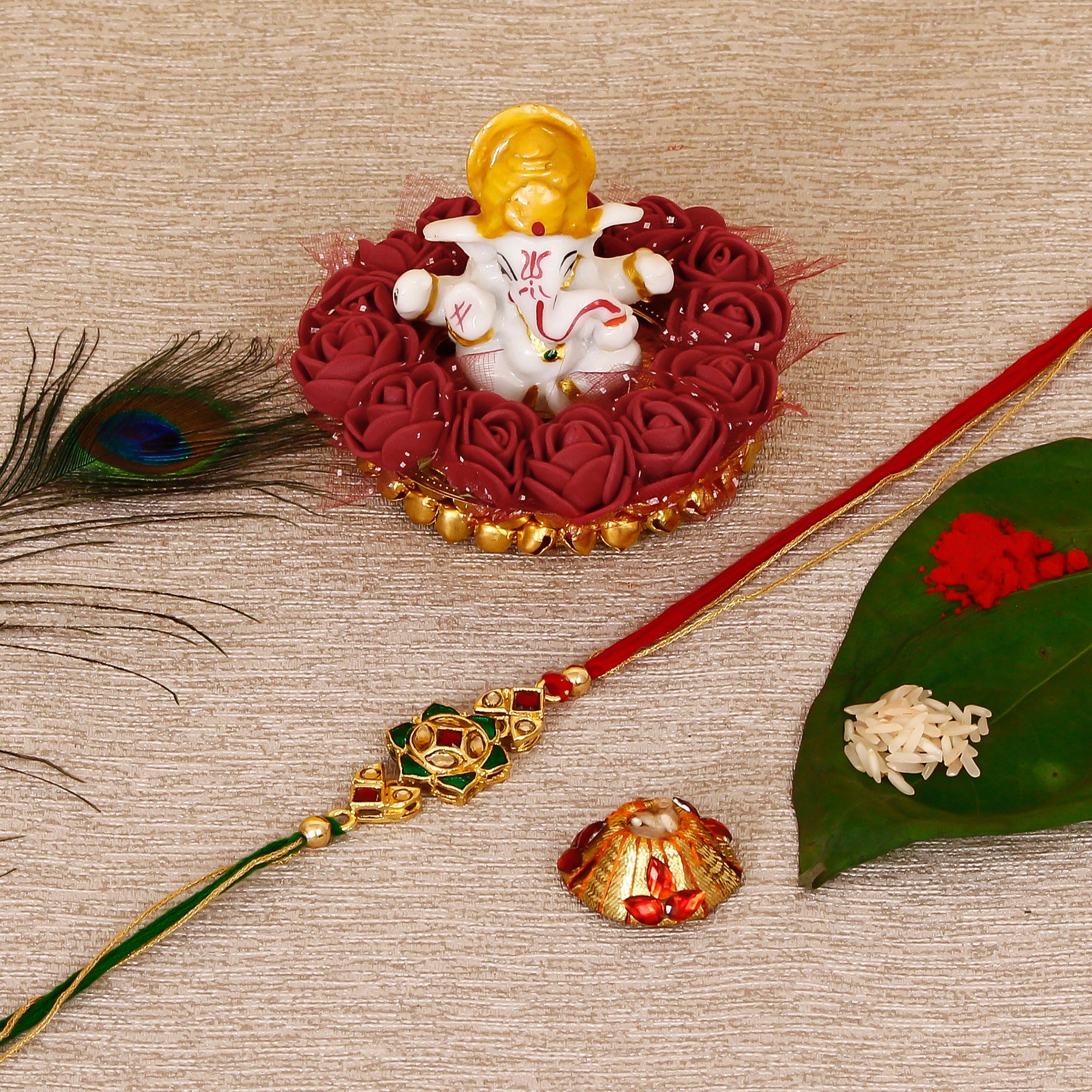 Designer Kundan Rakhi with Lord Ganesha Idol on Decorative Plate for Car & Home and Roli Tikka Matki Kafalo
