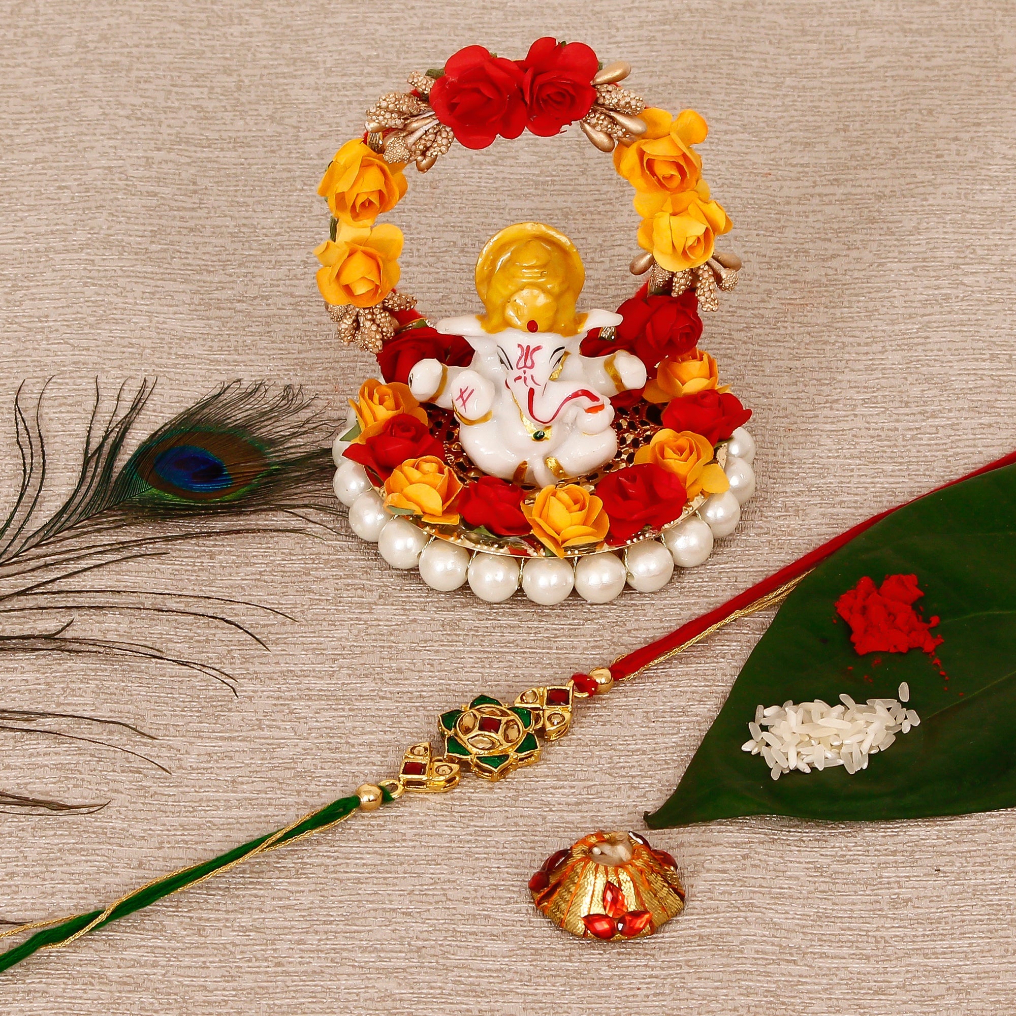 Designer Kundan Rakhi with Lord Ganesha Idol on Decorative Plate for Car & Home and Roli Tikka Matki Kafalo