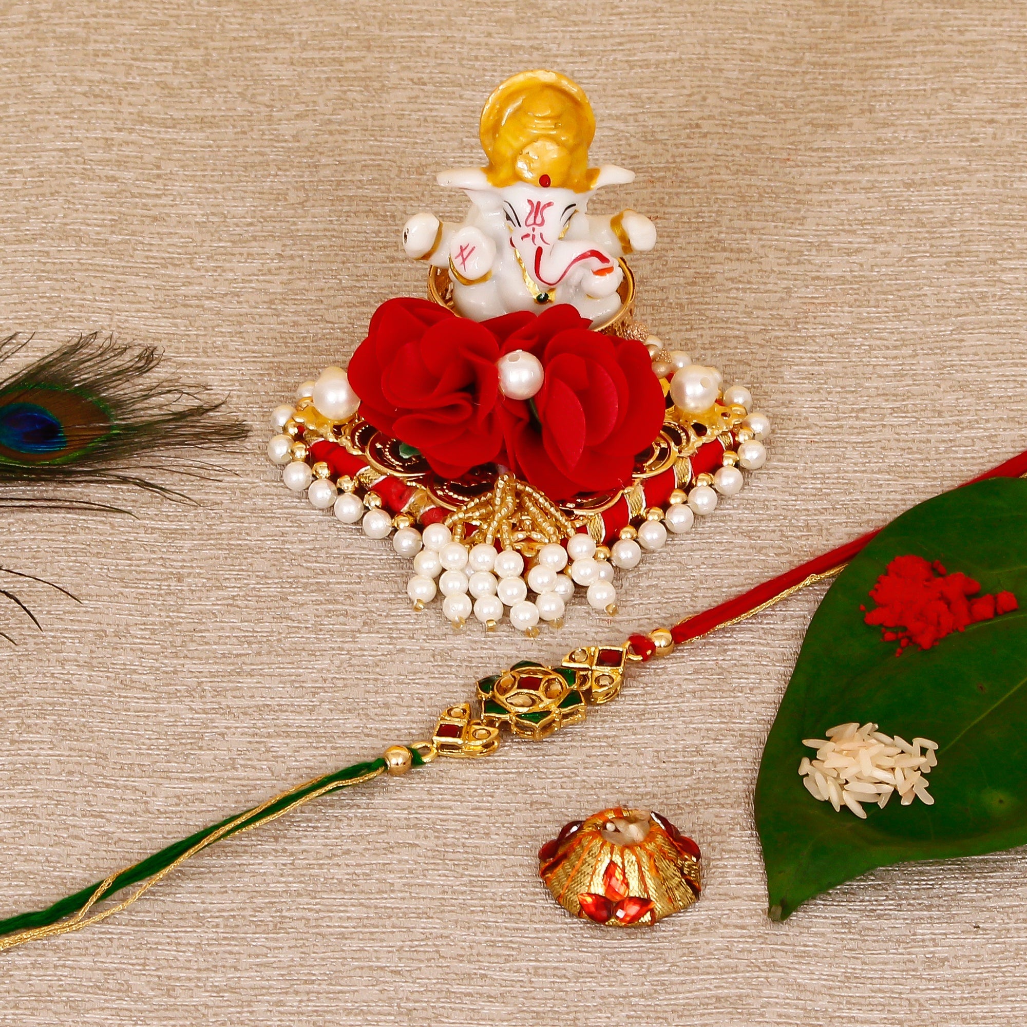 Designer Kundan Rakhi with Lord Ganesha Idol on Decorative Plate for Car & Home and Roli Tikka Matki Kafalo