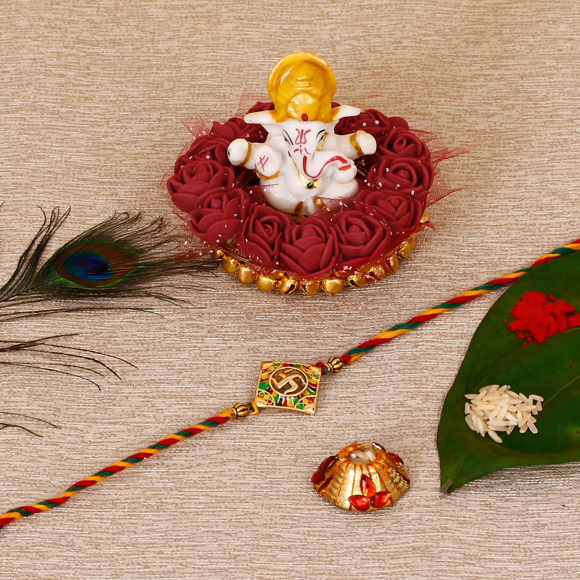 Designer Religious Swastik Rakhi with Lord Ganesha Idol on Decorative Plate for Car & Home and Roli Tikka Matki Kafalo
