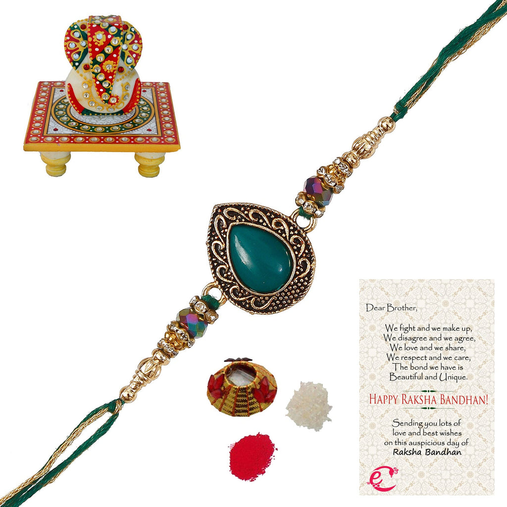 Designer Stone Rakhi with Lord Ganesha on Kundan Studded Marble Chowki and Roli Tikka Matki, Best Wishes Greeting Card Kafalo
