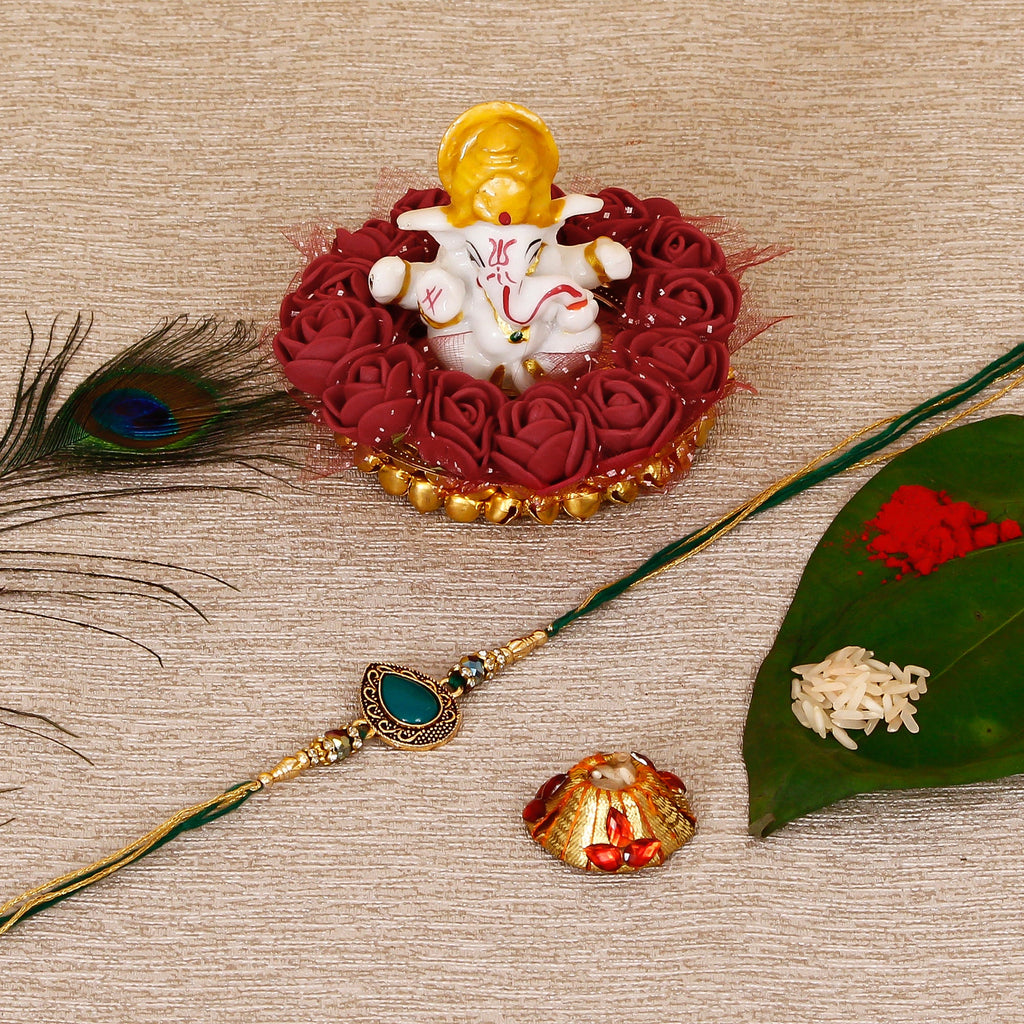Designer Stone Rakhi with Lord Ganesha Idol on Decorative Plate for Car & Home and Roli Tikka Matki Kafalo