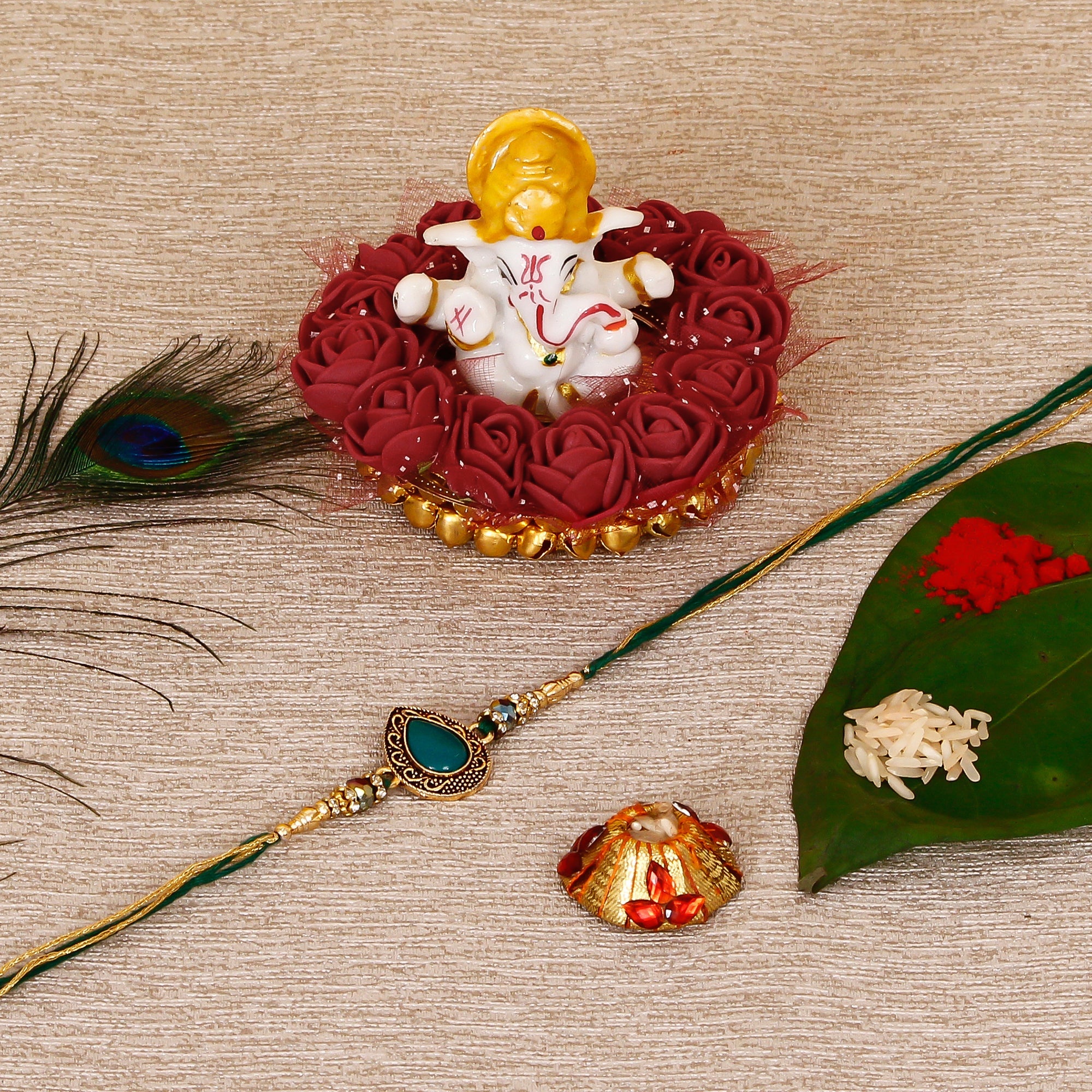 Designer Stone Rakhi with Lord Ganesha Idol on Decorative Plate for Car & Home and Roli Tikka Matki Kafalo