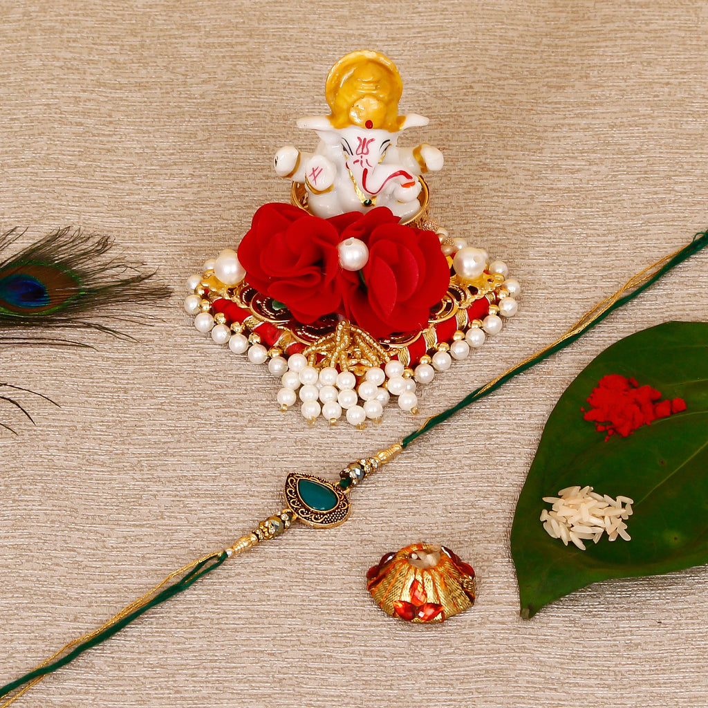Designer Stone Rakhi with Lord Ganesha Idol on Decorative Plate for Car & Home and Roli Tikka Matki Kafalo