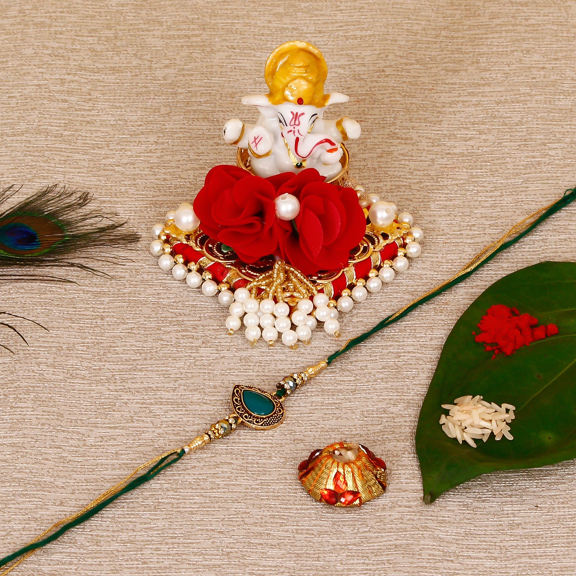 Designer Stone Rakhi with Lord Ganesha Idol on Decorative Plate for Car & Home and Roli Tikka Matki Kafalo