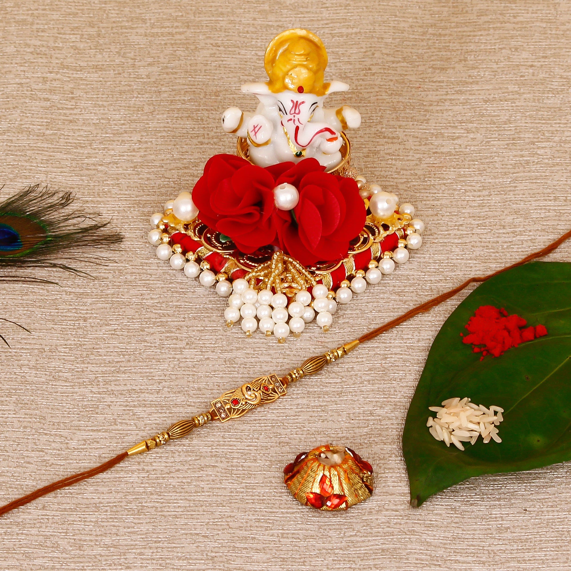Designer Religious Rakhi with Lord Ganesha Idol on Decorative Plate for Car & Home and Roli Tikka Matki Kafalo