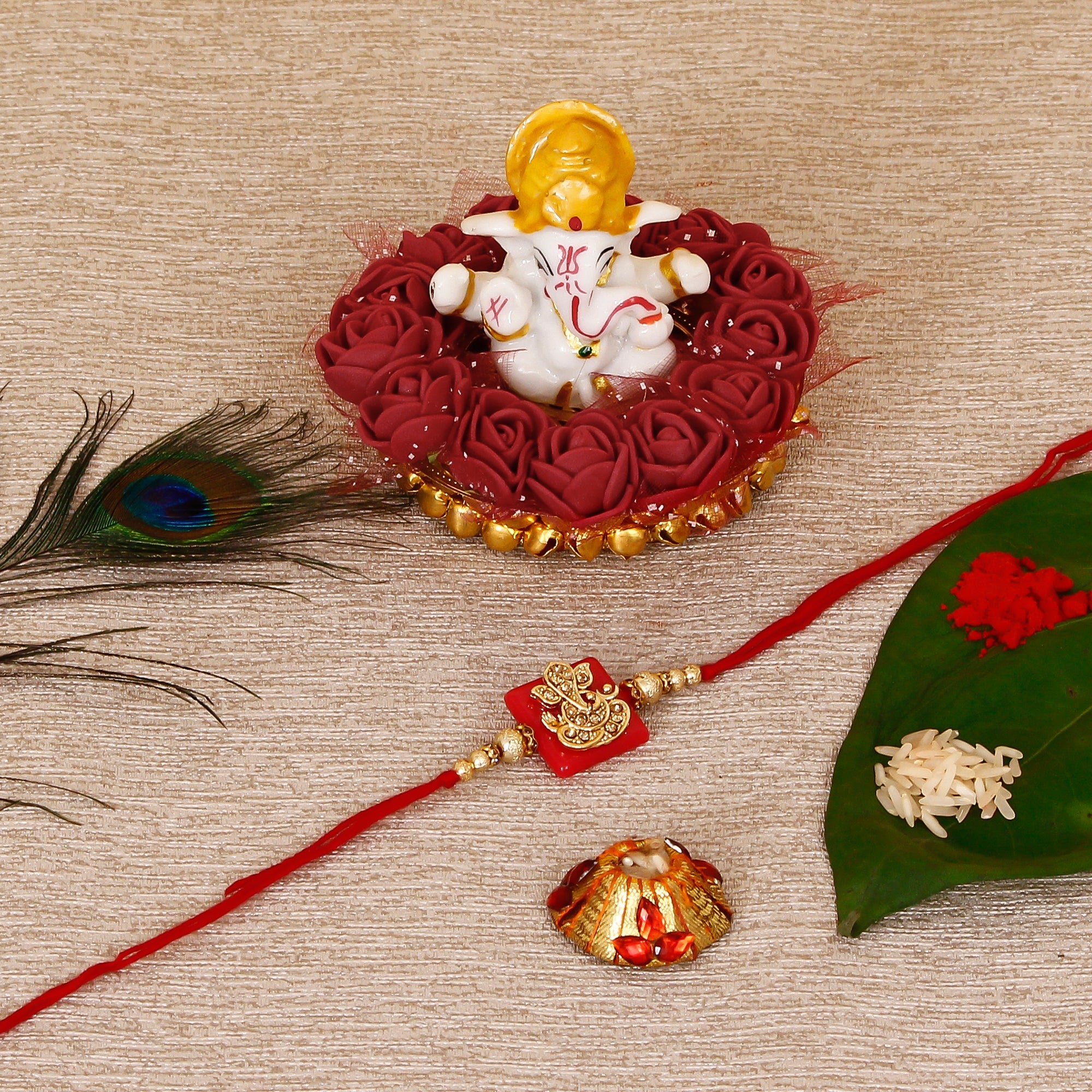 Designer Religious Ganesha Rakhi with Lord Ganesha Idol on Decorative Plate for Car & Home and Roli Tikka Matki Kafalo